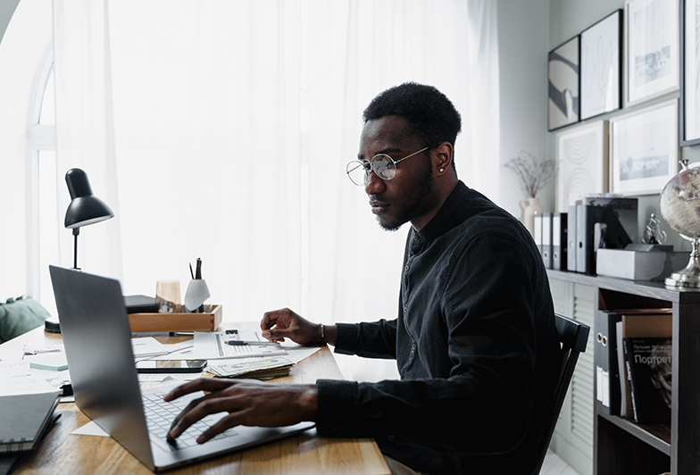 An investor compiles the latest news and research to make an informed financial decision