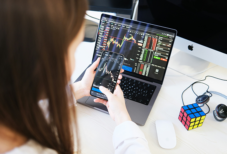 Woman looks over her personal investment portfolio